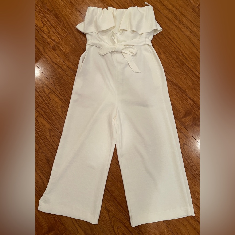 Aritzia White Flowy Jumpsuit with Tie-Front and Pockets!